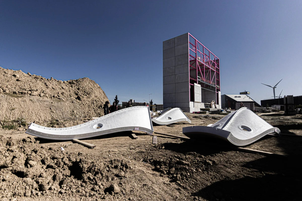The photo shows the glass-plastic components of the TT45 Pro wind tunnel's airjet (confusor) under assembly at the Luxfly facility. These elements are part of the aerodynamic system designed for stable, low-turbulence airflow.
